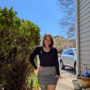 Chic Black Mini Skirt with Elegant Lace Trim